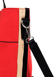 a person holding a pair of skis and poles 